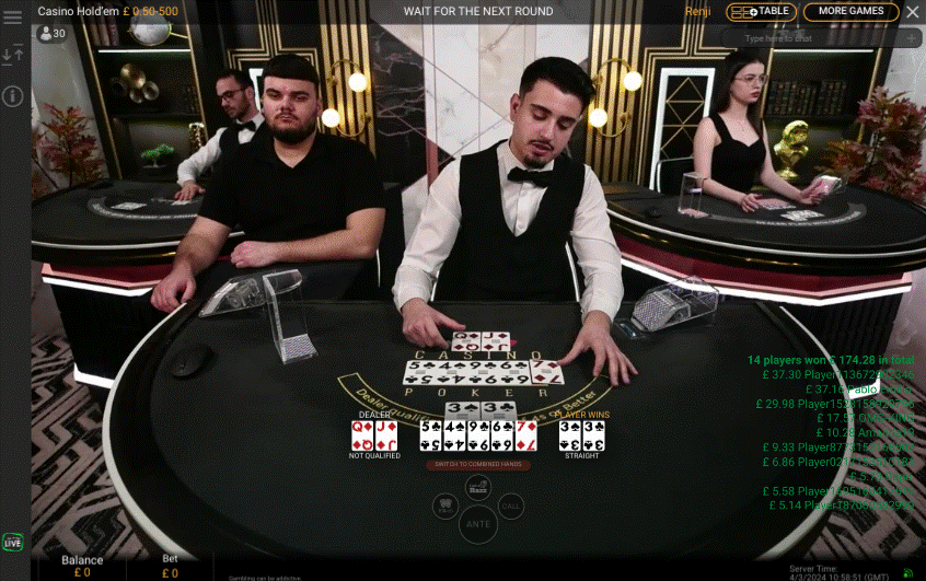 Playtech Live Casino Holdem game with large black table complete with playing cards, smartly dress live dealer, and casually dressed card shuffler set in a decadent black and white marble studio