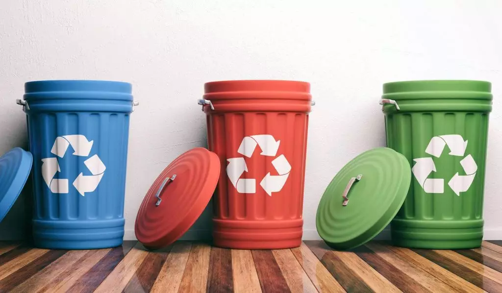 Trash bins with recycle logo